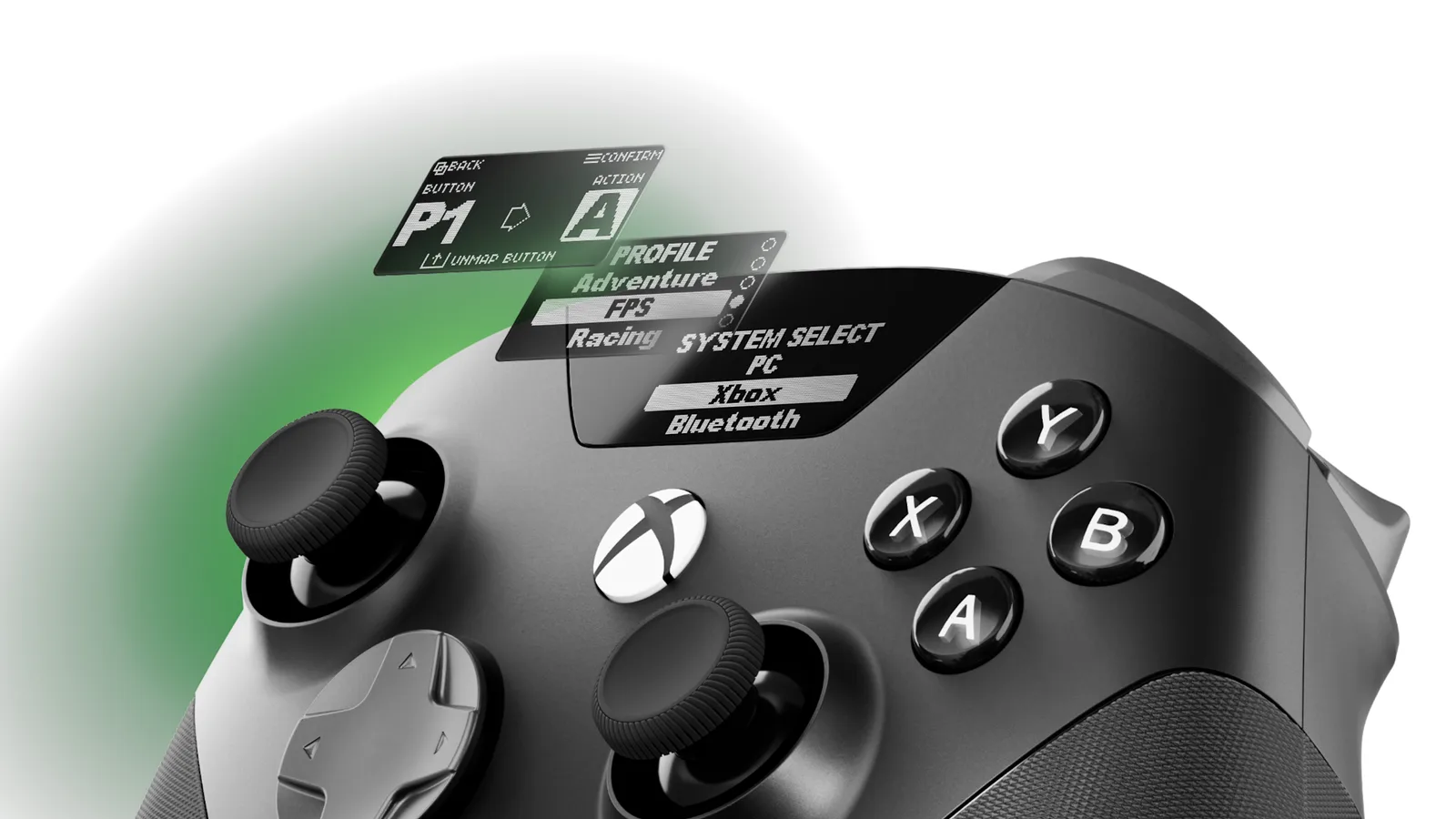 이온 프로 전면 OLED 화면에 SYSTEM SELECT 메뉴에서 PC, Xbox, Bluetooth를 고르는 화면과 프로필, 버튼 재할당 화면이 겹쳐 보인다